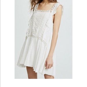 Priscilla white ruffle sleeve daytime mini dress